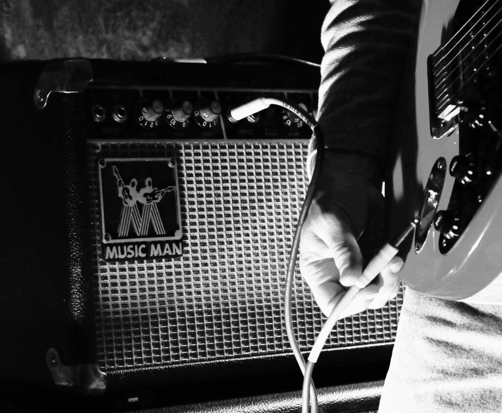 Music Man and Yellow Fender Stratocaster (in Black and White2)